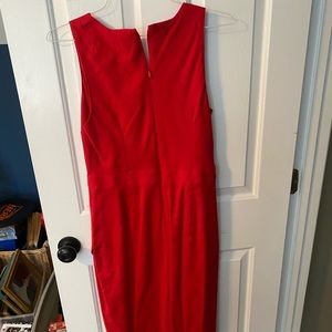 Red linen knee length dress. Slit at bottom